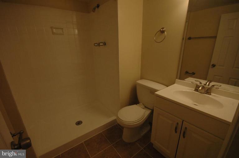 3761 Stonesboro Road Fort Washington, MD 20744 - Photo 23 of 30 a bathroom with a sink toilet and shower