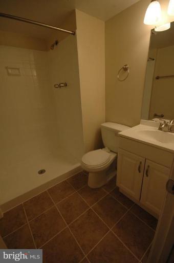 3761 Stonesboro Road Fort Washington, MD 20744 - Photo 24 of 30 a bathroom with a sink toilet and shower