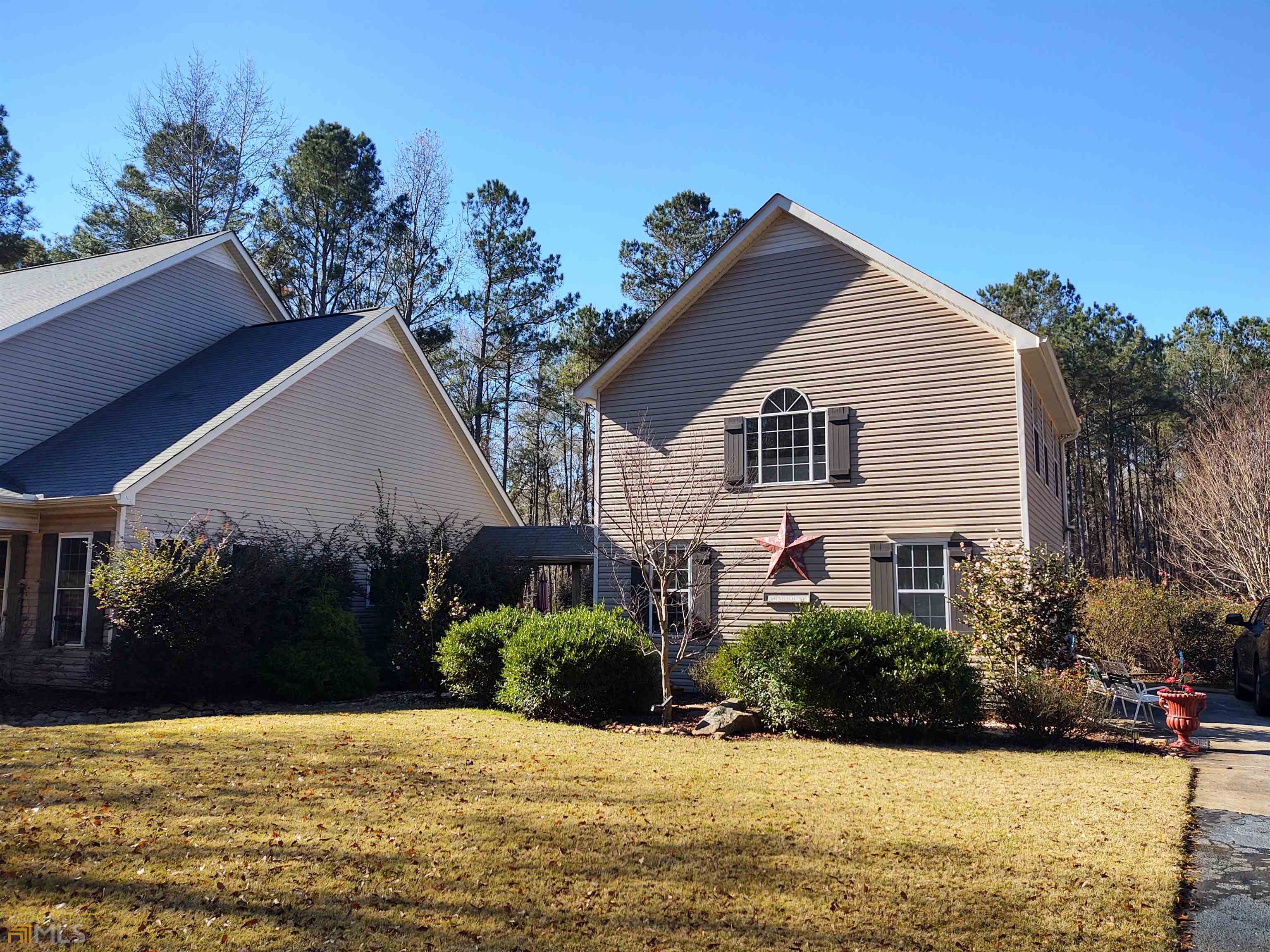 1467 Elders Mill Road, Unit ABOVE Senoia, GA 30276 - Photo 1 of 18 a view of a house with yard and tree s