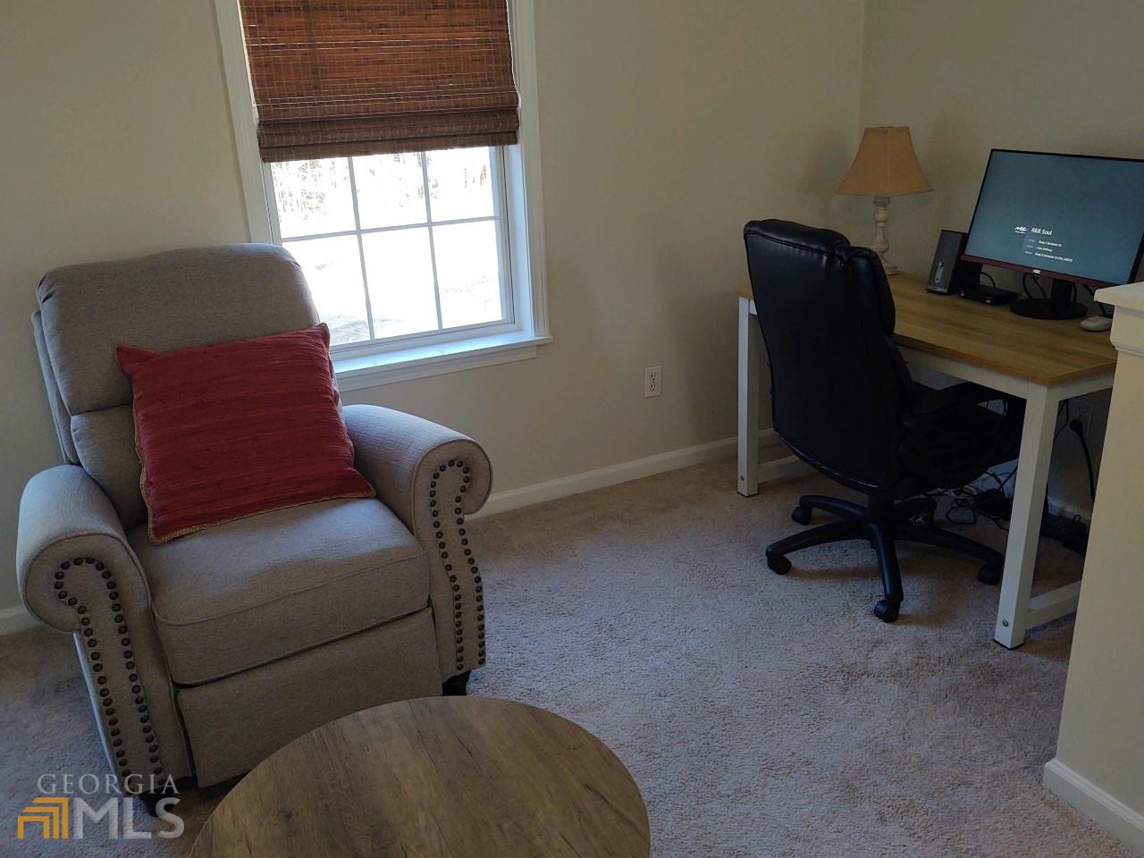 1467 Elders Mill Road, Unit ABOVE Senoia, GA 30276 - Photo 12 of 18 a living room with furniture and a window