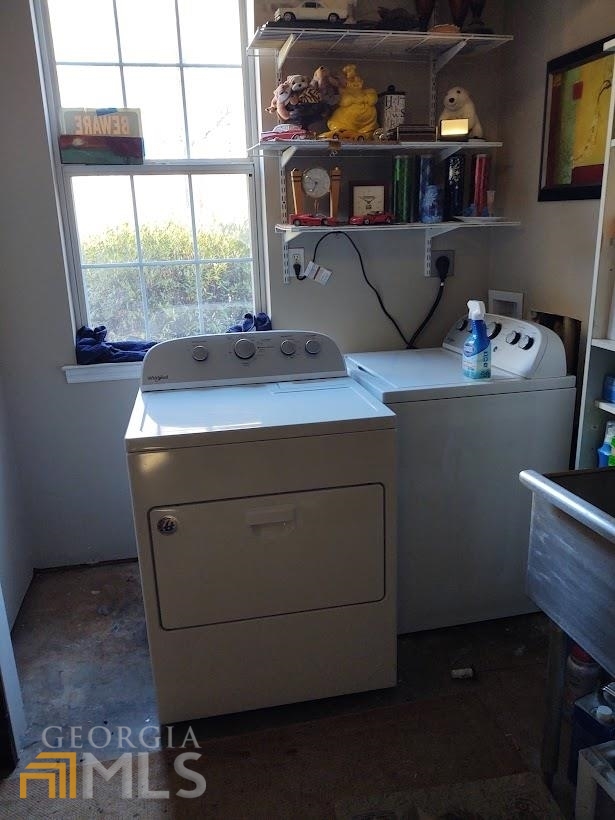 1467 Elders Mill Road, Unit ABOVE Senoia, GA 30276 - Photo 17 of 18 a room with storage and utility