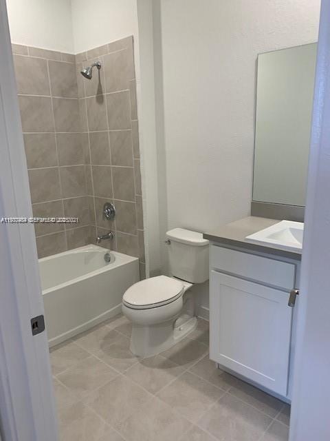 731 Southwest 11th Street Florida City, FL 33034 - Photo 13 of 13 a bathroom with a toilet a sink and bathtub