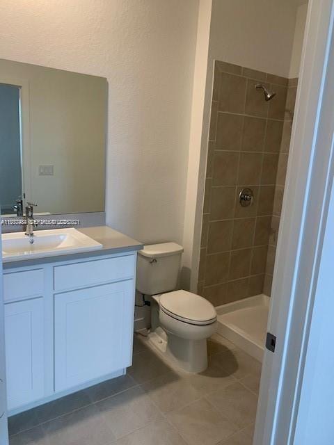 731 Southwest 11th Street Florida City, FL 33034 - Photo 7 of 13 a bathroom with a sink a toilet and shower