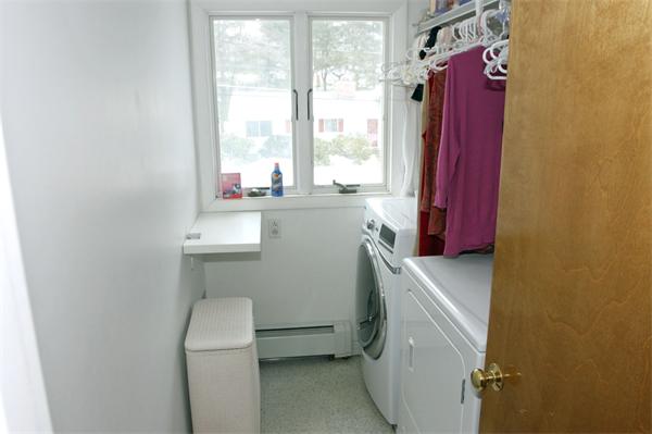 64 Damon Road Needham, MA 02494 - Photo 14 of 19 a bathroom with a sink a toilet and window