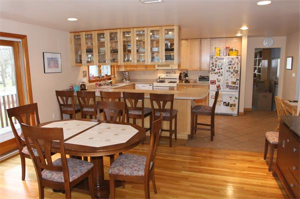 64 Damon Road Needham, MA 02494 - Photo 3 of 19 a view of a dining room with furniture and wooden floor