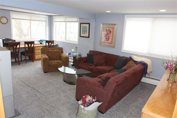 64 Damon Road Needham, MA 02494 - Photo 7 of 19 a living room with furniture and a large window