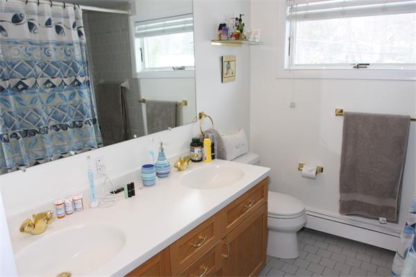 64 Damon Road Needham, MA 02494 - Photo 9 of 19 a bathroom with a sink toilet and tub