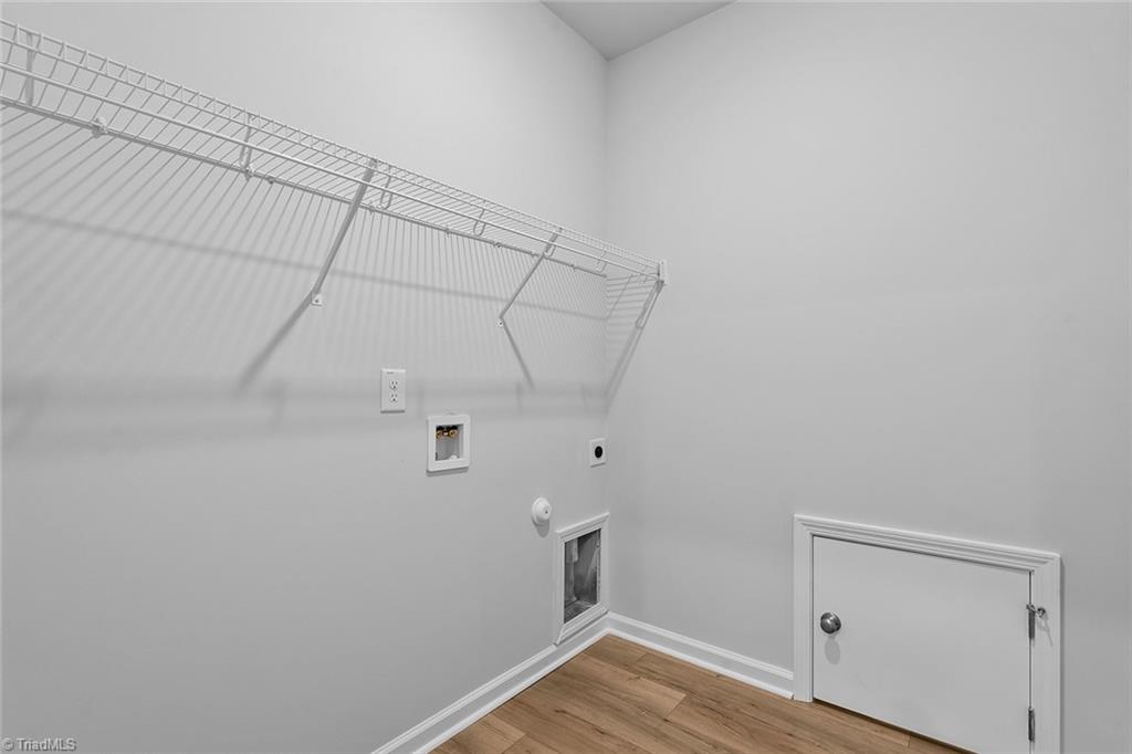 151 Candytuft Court Lexington, NC 27295 - Photo 24 of 33 Primary Closet - with laundry pass through
