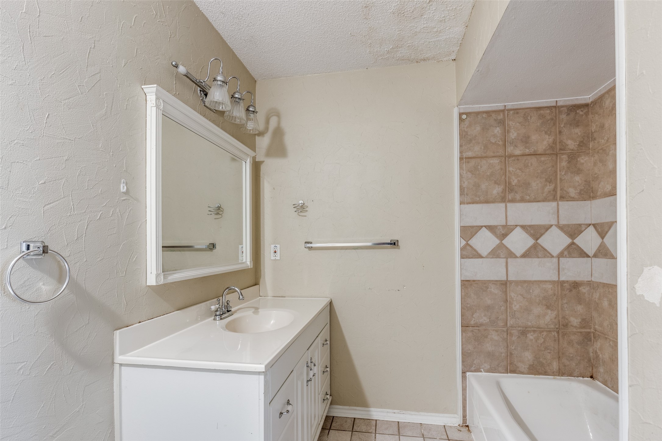 24010 Landing Way Drive Spring, TX 77373 - Photo 12 of 25 a bathroom with a sink and a mirror