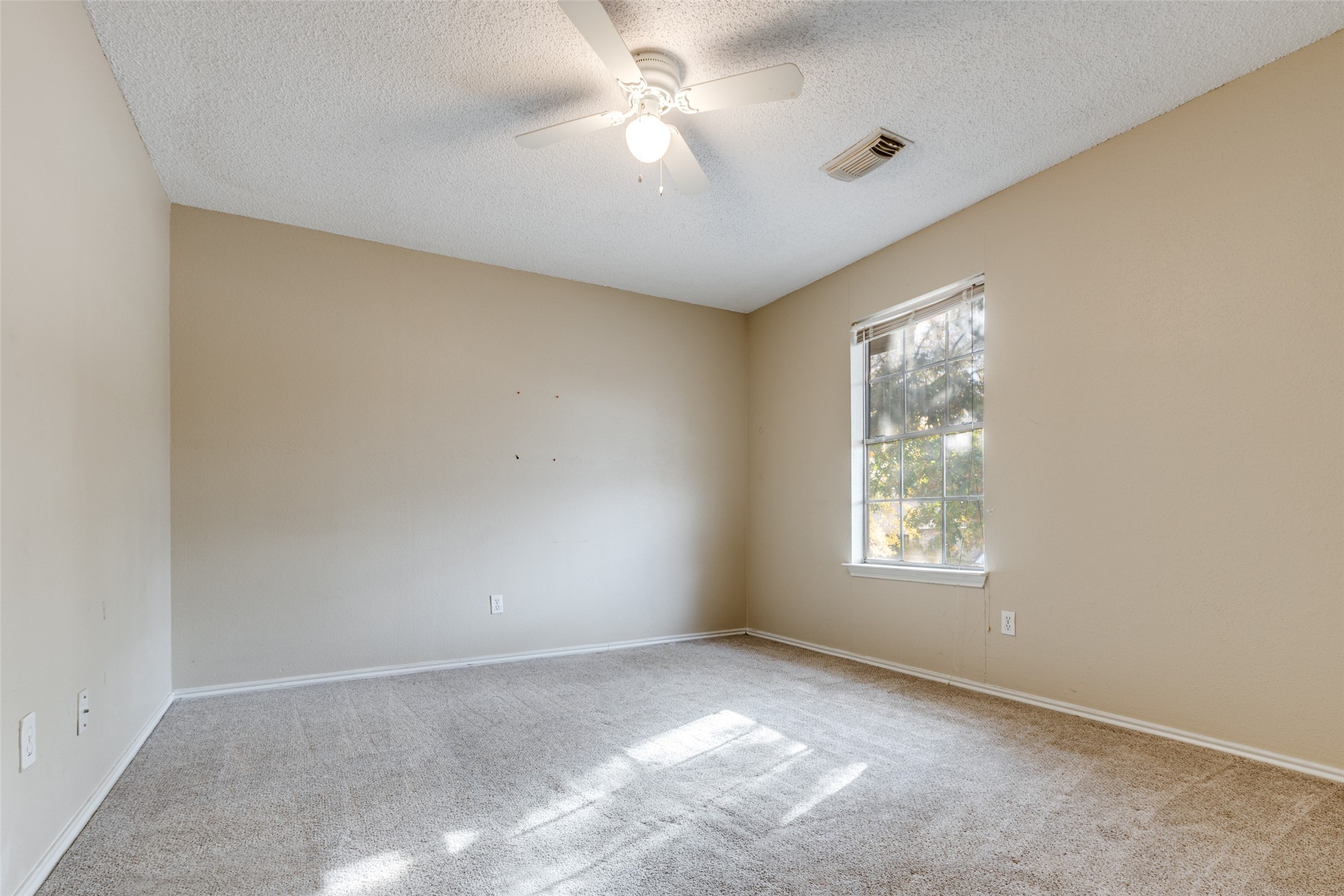 24010 Landing Way Drive Spring, TX 77373 - Photo 14 of 25 a view of an empty room with a window