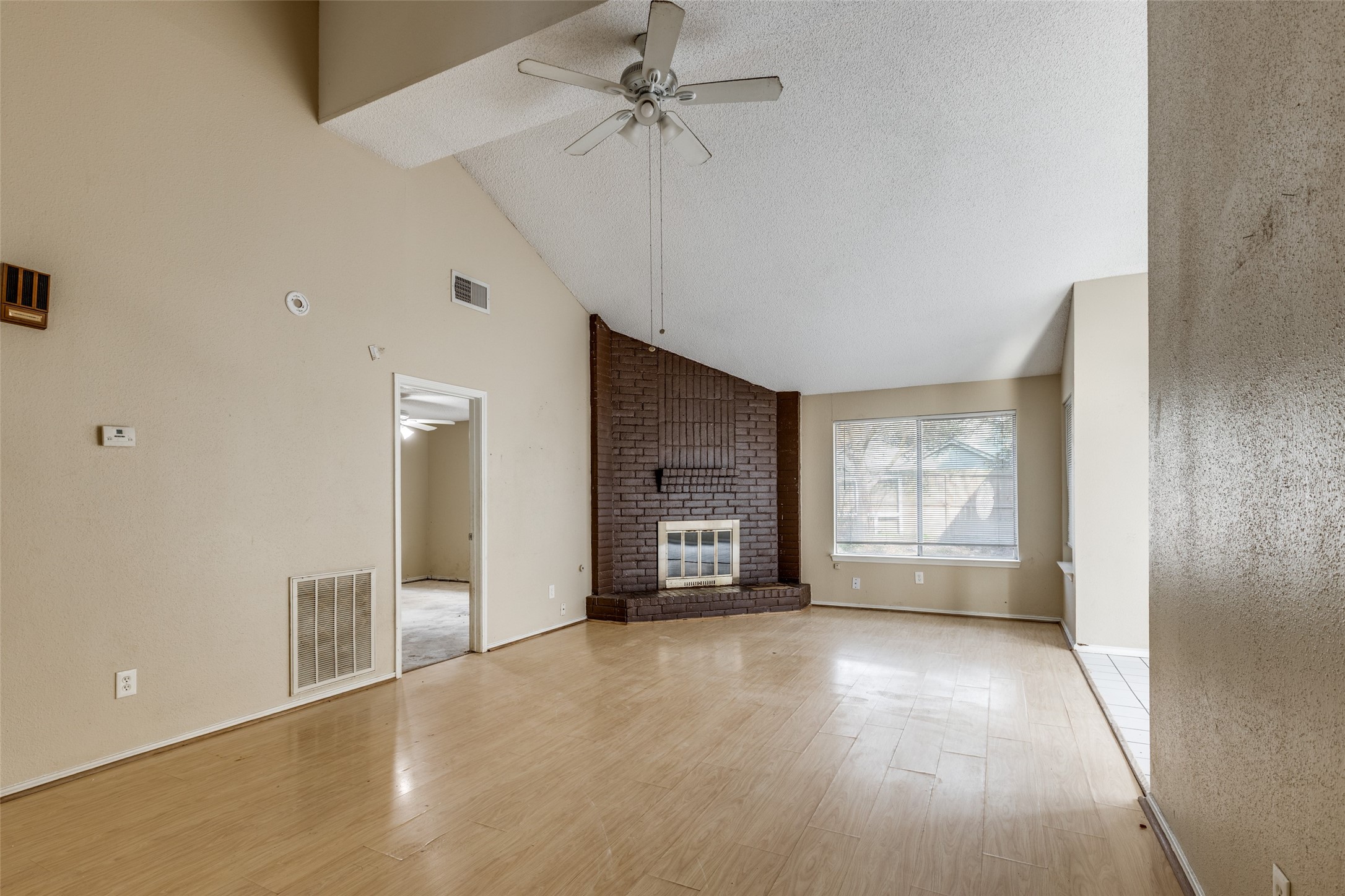 24010 Landing Way Drive Spring, TX 77373 - Photo 2 of 25 wooden floor in an empty room with a window