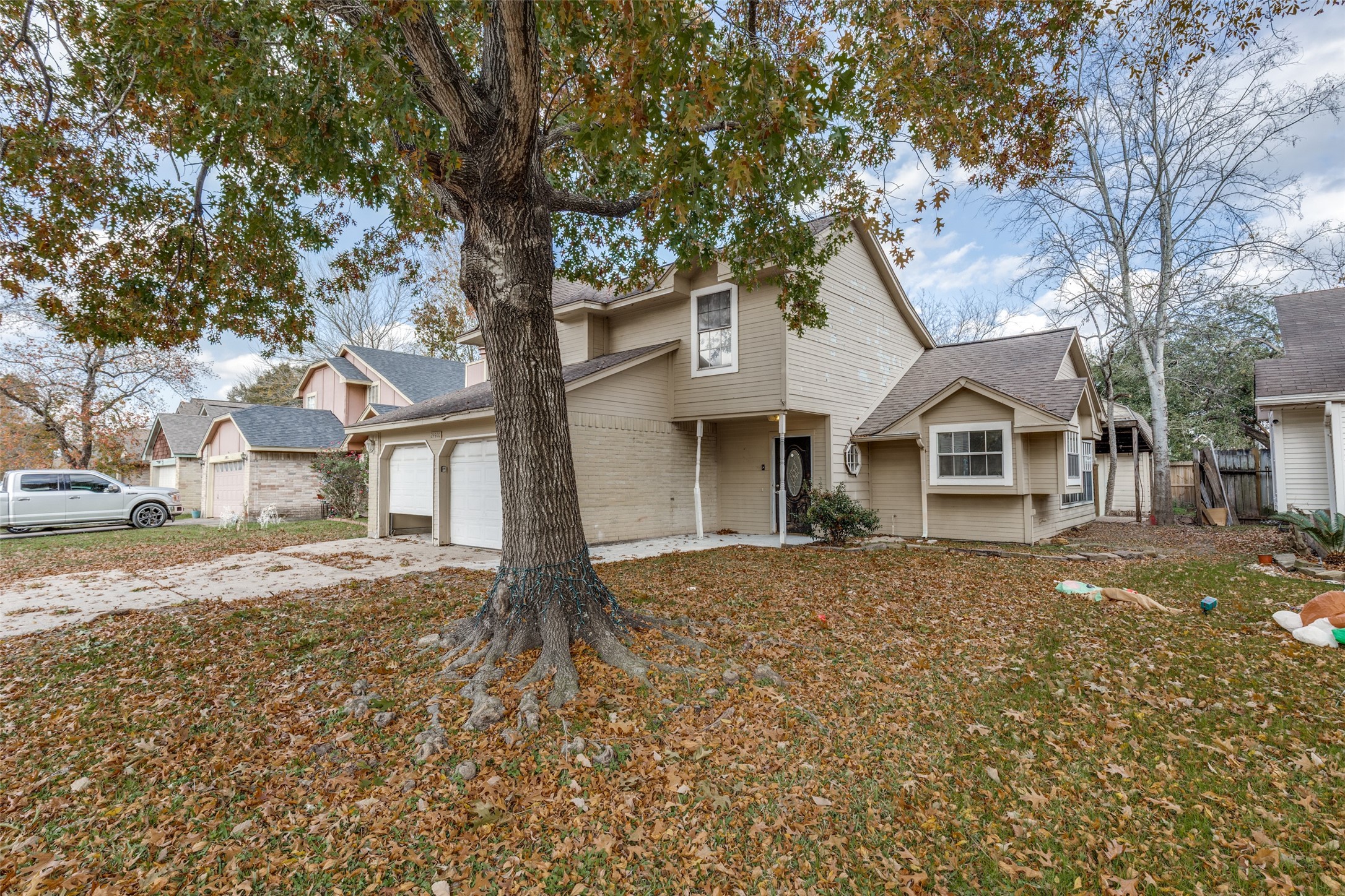 24010 Landing Way Drive Spring, TX 77373 - Photo 23 of 25 a front view of a house with a yard