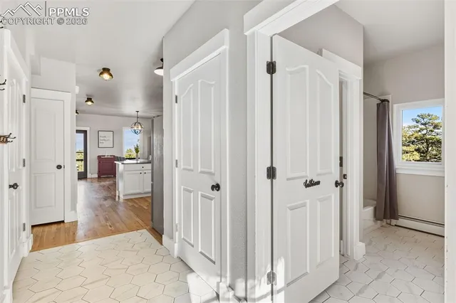 a view of a bathroom with tub and shower