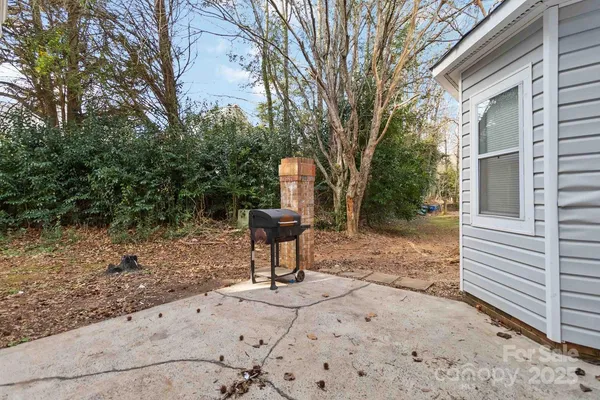 a house view with a backyard space