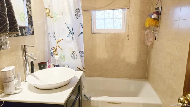 a view of a dining room with furniture and window