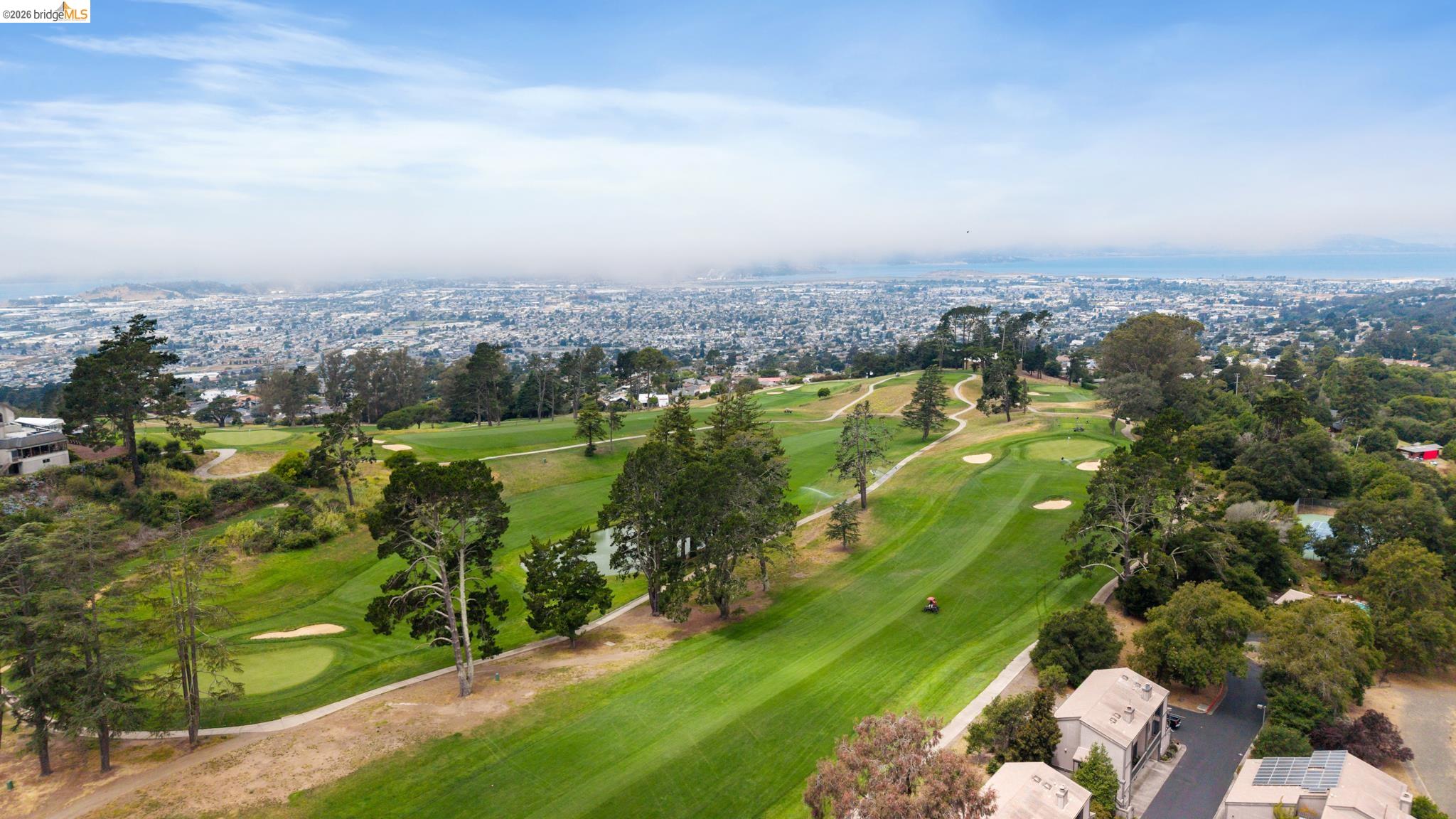 201 Vista Heights Road El Cerrito, CA 94530 - Photo 26 of 32 Expansive golf course setting featuring manicured fairways and mature trees