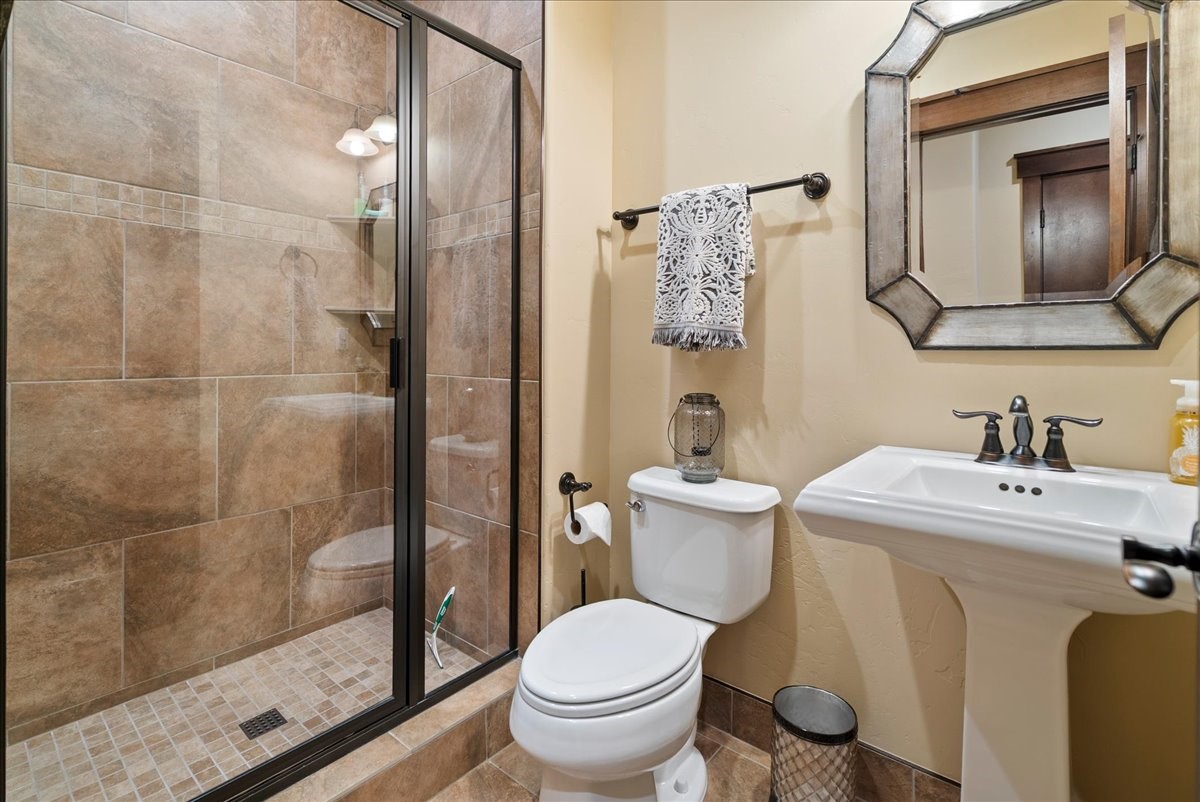 853 Independence Road, Unit 853 Keystone, CO 80435 - Photo 19 of 37 a bathroom with a sink toilet and shower