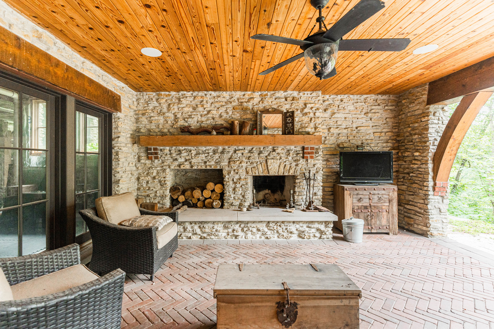 6N691 State Rte 31 St. Charles, IL 60175 - Photo 62 of 76 a living room with furniture a fireplace and a table