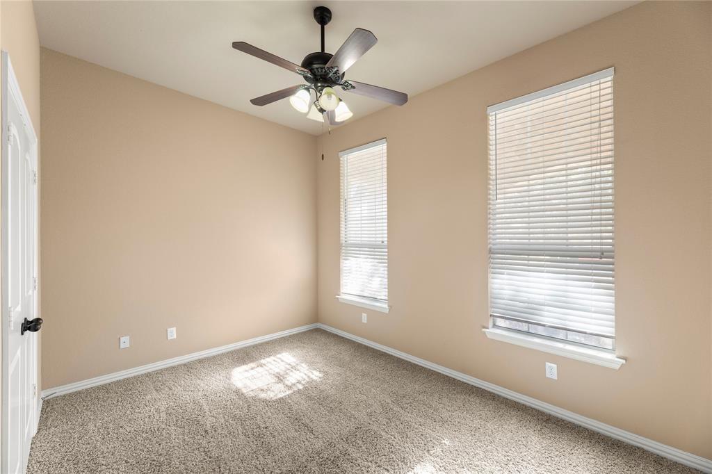8245 Edgepoint Trail Fort Worth, TX 76053 - Photo 5 of 28 a view of an empty room with a window