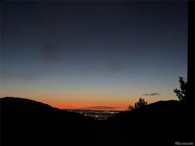 a view of a backyard of a house