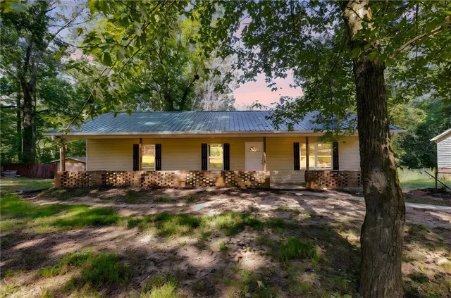 a view of a house with a patio