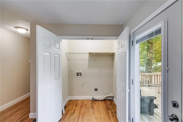 a bathroom with a tub and shower