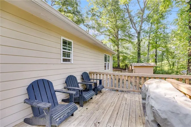 a view of roof deck with patio