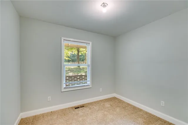 an empty room with a window