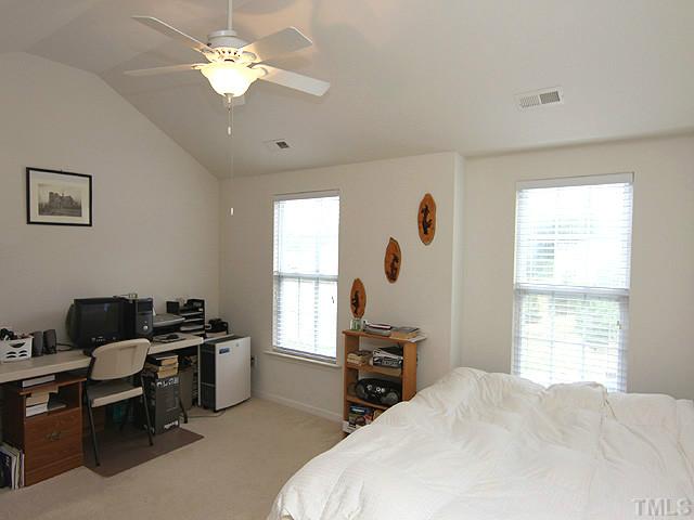 5317 Daleview Drive Raleigh, NC 27610 - Photo 12 of 14 a bedroom with a bed furniture and a window