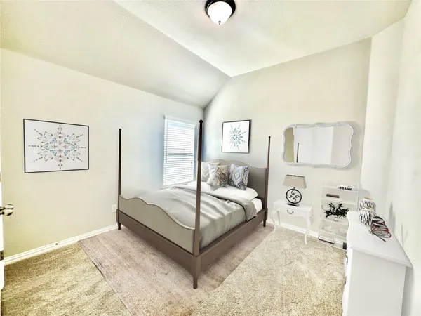 a spacious bedroom with a bed and window