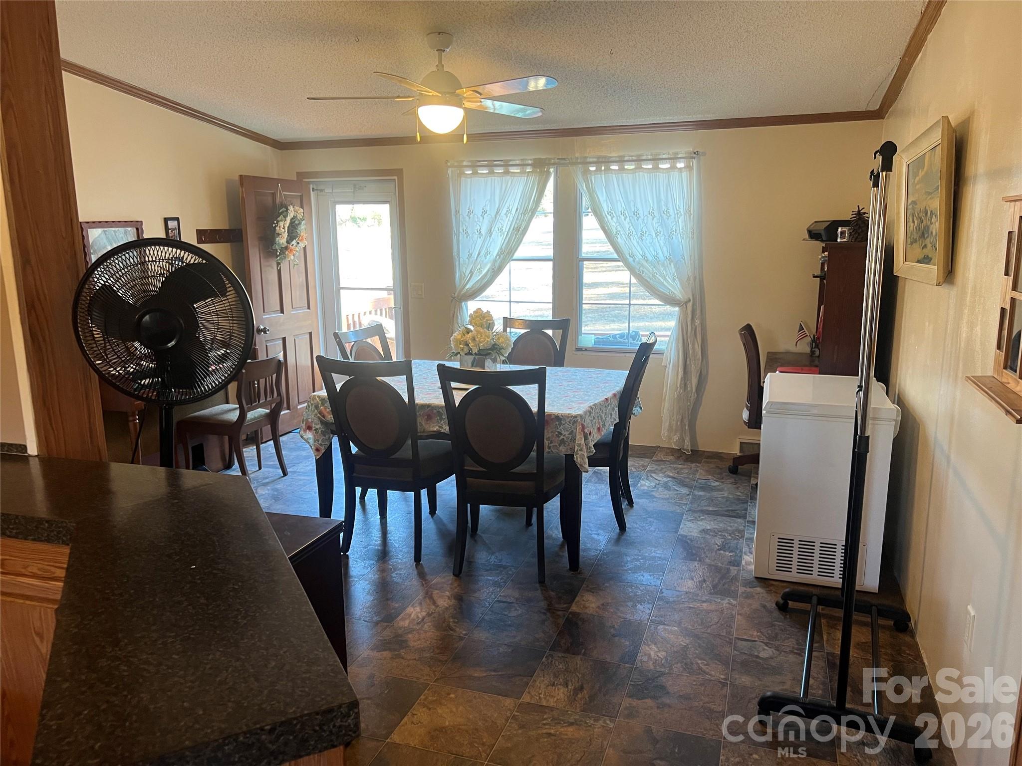 2082 Mary D Road, Unit 1 Chesterfield, SC 29709 - Photo 2 of 33 a view of a dining room with furniture window and outside view