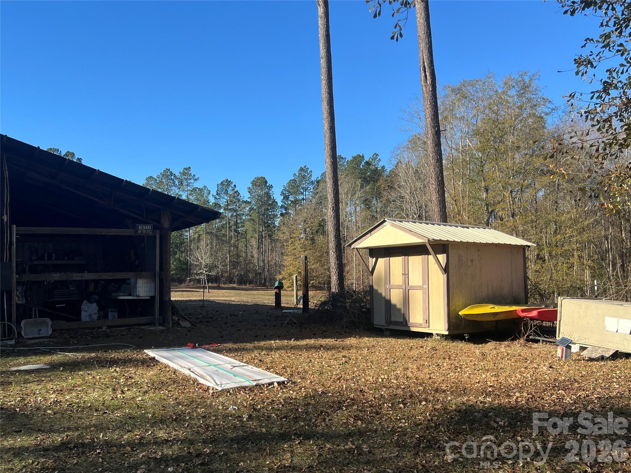 2082 Mary D Road, Unit 1 Chesterfield, SC 29709 - Photo 24 of 33 a backyard of a house with yard fire pit and outdoor seating