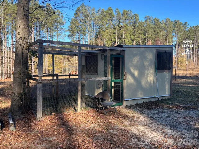 a view of a big yard with a house