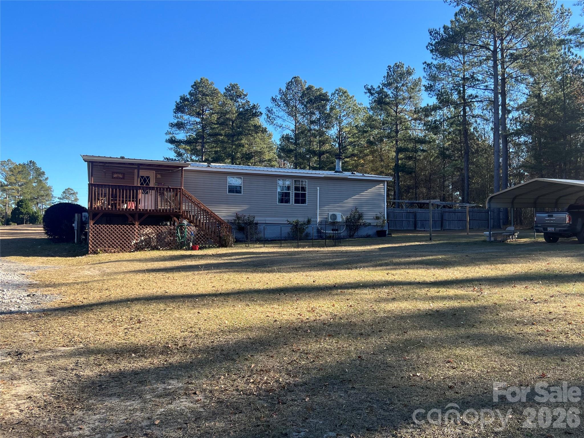 2082 Mary D Road, Unit 1 Chesterfield, SC 29709 - Photo 27 of 33 a view of swimming pool with a yard and plants