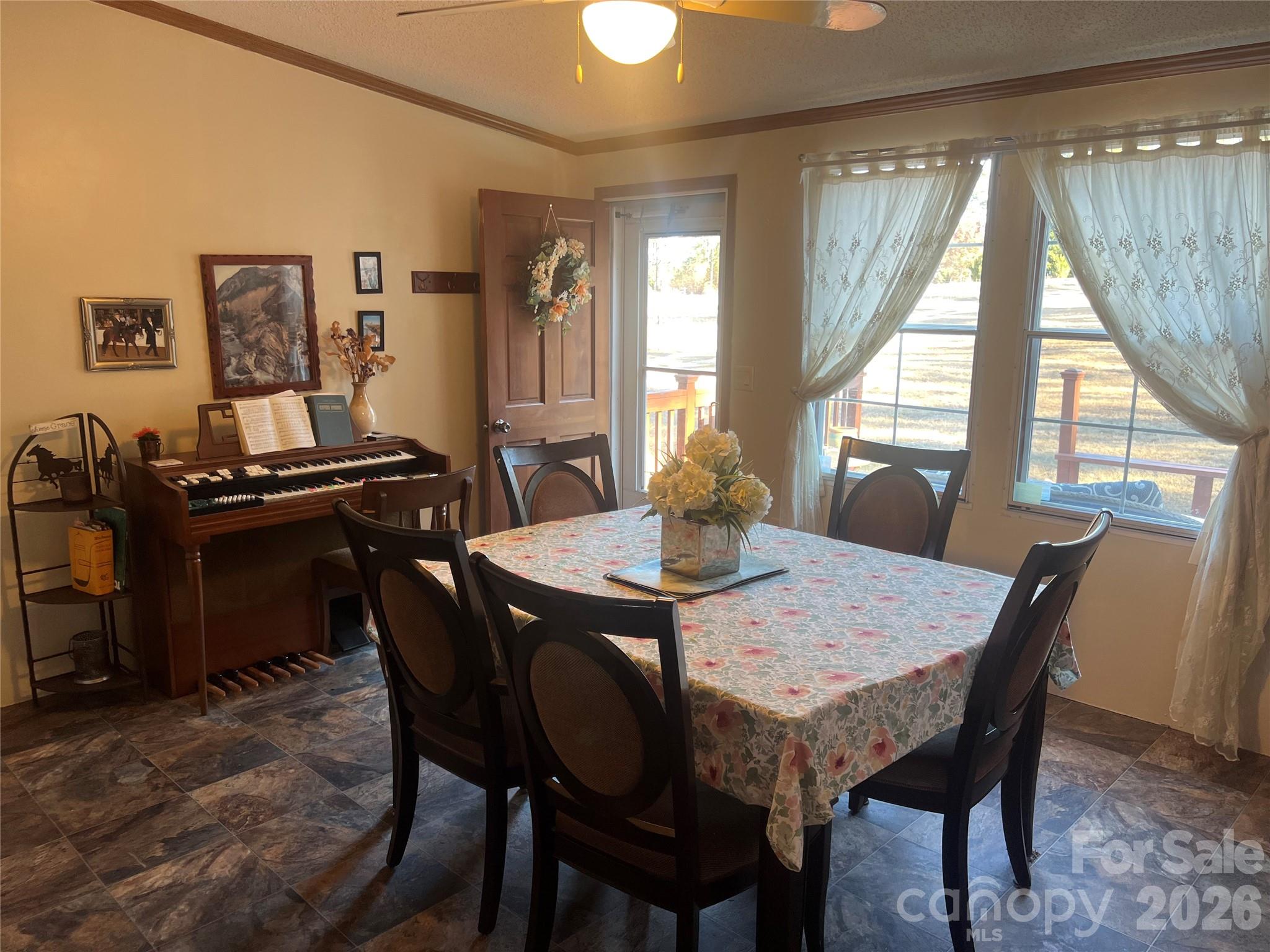 2082 Mary D Road, Unit 1 Chesterfield, SC 29709 - Photo 3 of 33 a view of a dining room with furniture and window