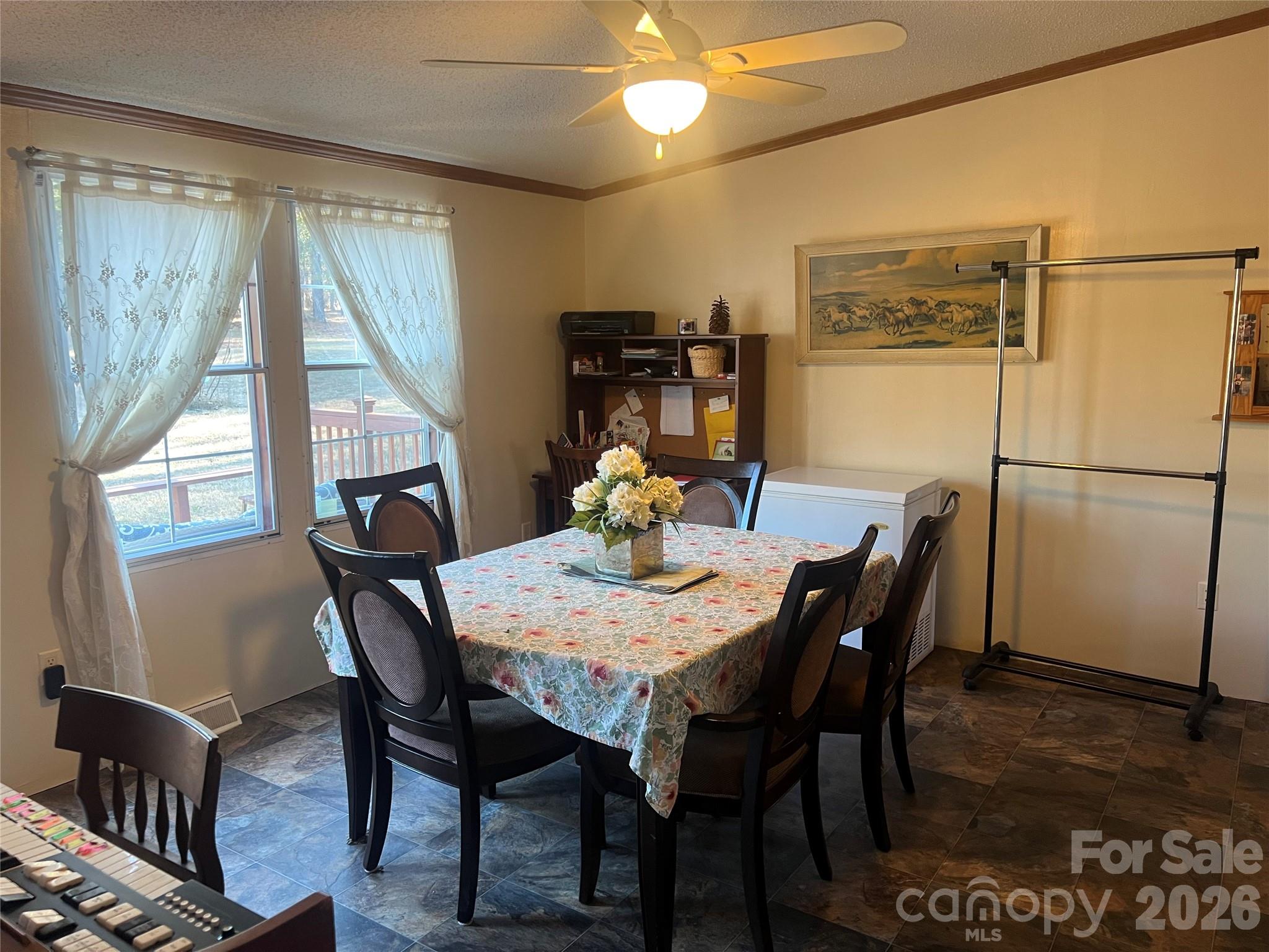 2082 Mary D Road, Unit 1 Chesterfield, SC 29709 - Photo 4 of 33 a view of a dining room with furniture window and wooden floor
