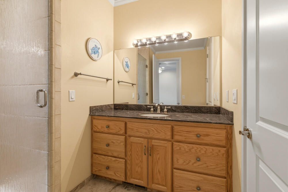 6586 Cooper's Hawk Road Klamath Falls, OR 97601 - Photo 46 of 68 a bathroom with a granite countertop sink and a mirror