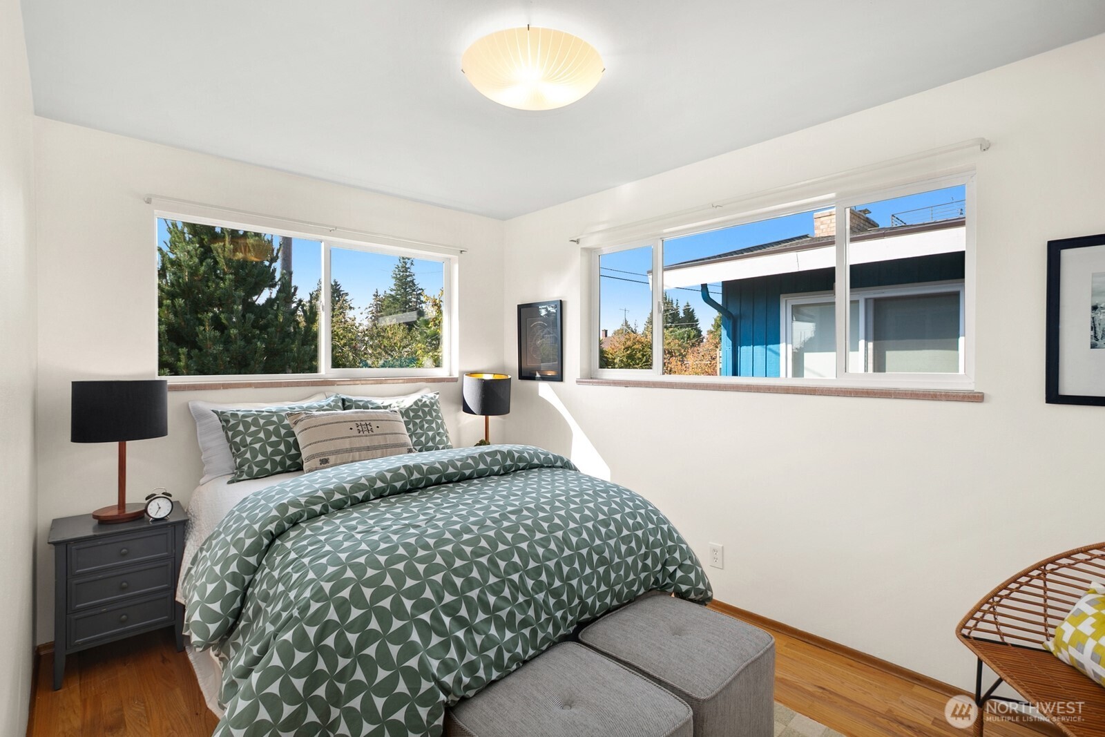 6024 48th Avenue Southwest Seattle, WA 98136 - Photo 14 of 40 a bedroom with a bed and a large window