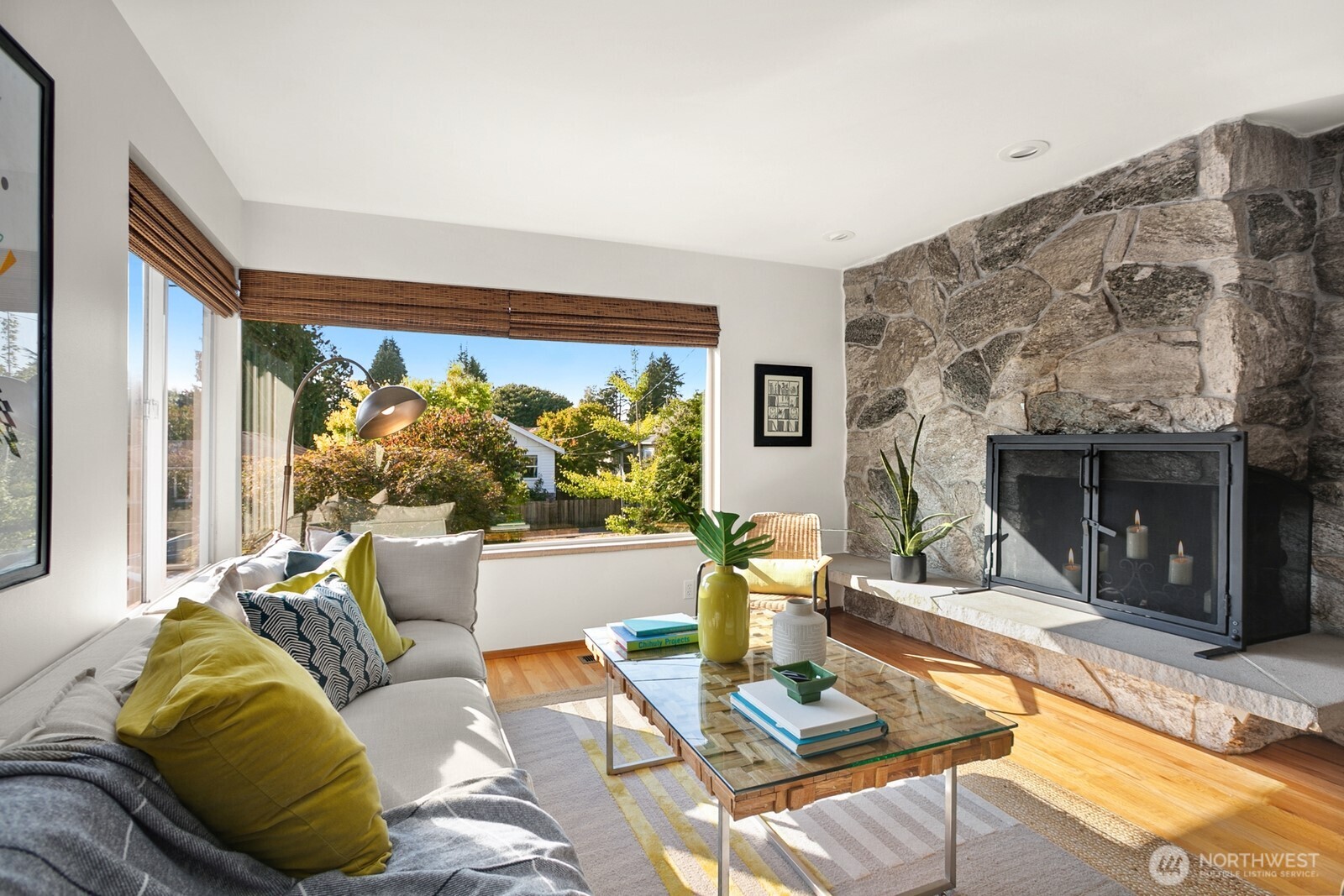 6024 48th Avenue Southwest Seattle, WA 98136 - Photo 2 of 40 a living room with furniture and a fireplace