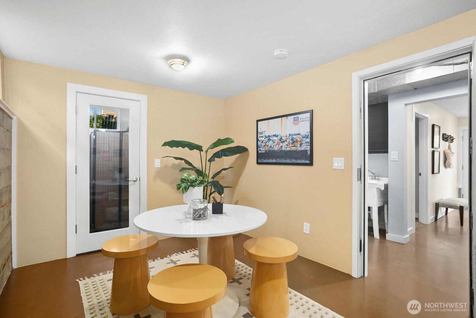 6024 48th Avenue Southwest Seattle, WA 98136 - Photo 22 of 40 a view of a dining room with a table and chairs