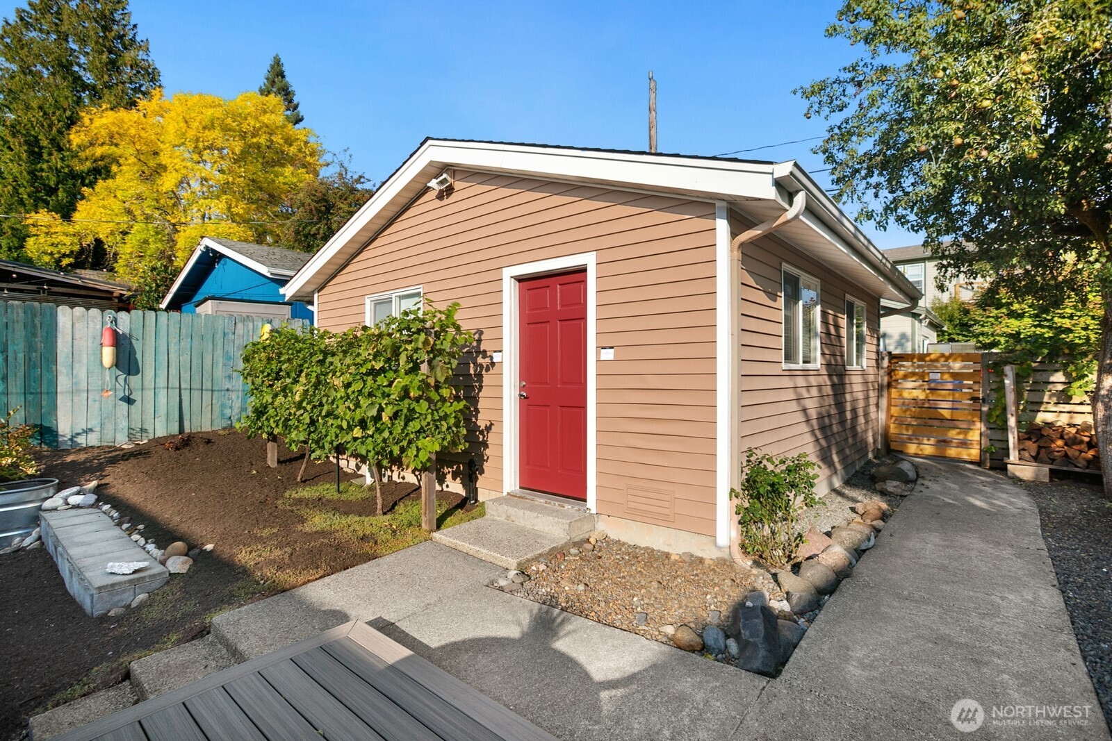 6024 48th Avenue Southwest Seattle, WA 98136 - Photo 31 of 40 a front view of a house with garden