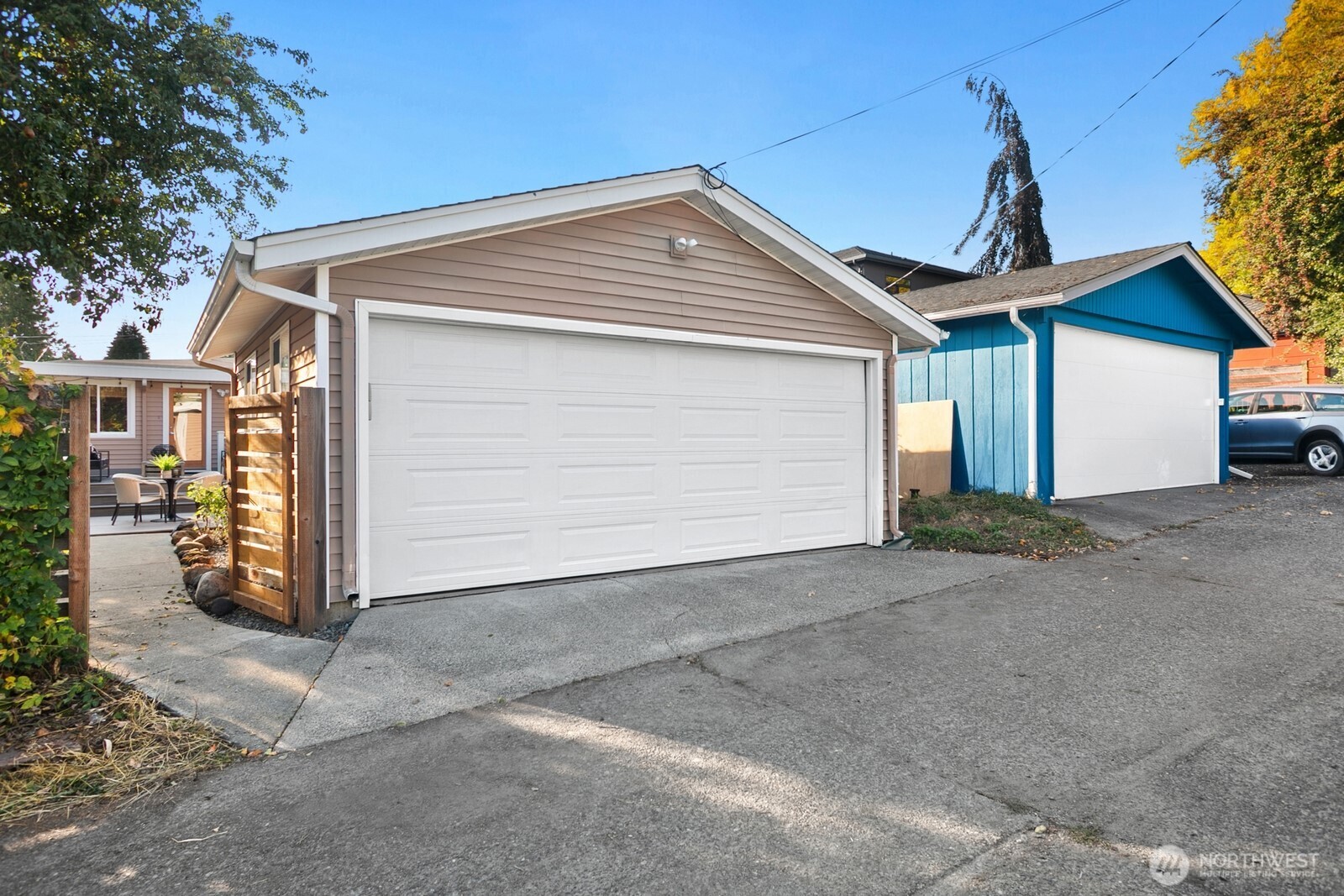 6024 48th Avenue Southwest Seattle, WA 98136 - Photo 32 of 40 a view of a house with a garage