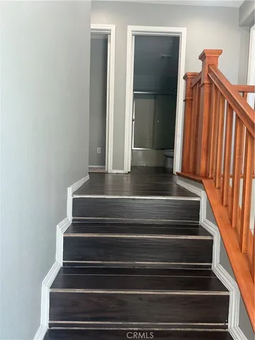 a view of room with window and ceiling fan