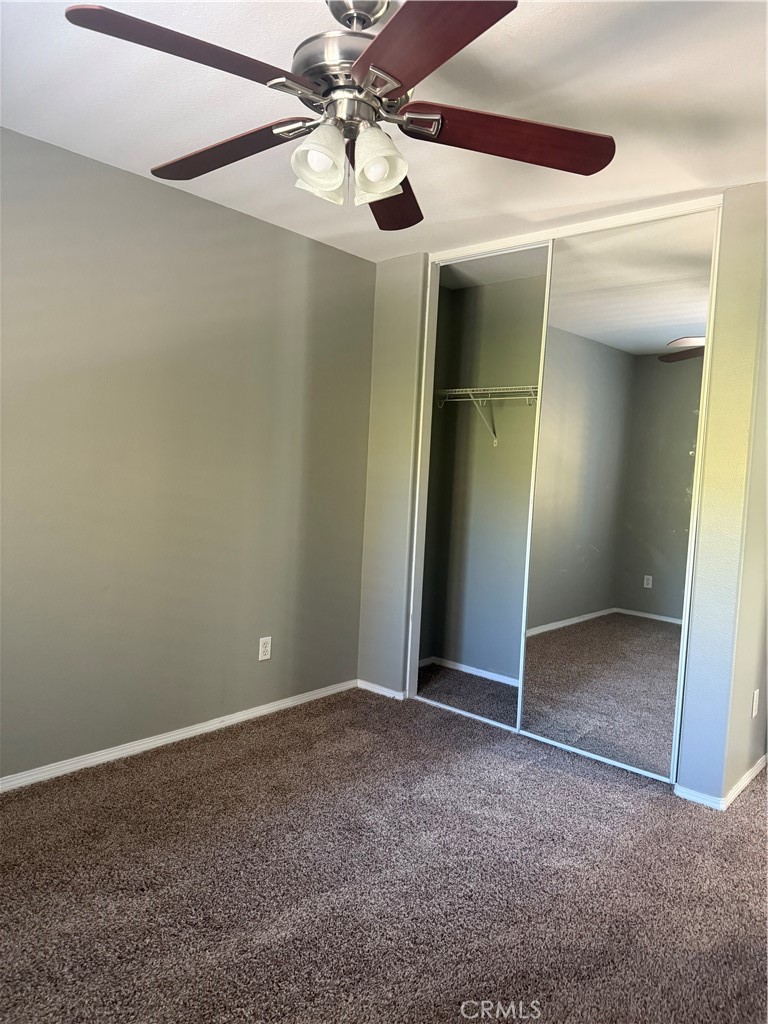 8692 East 9th Street, Unit 38 Rancho Cucamonga, CA 91730 - Photo 23 of 31 an empty room with fan and entrance