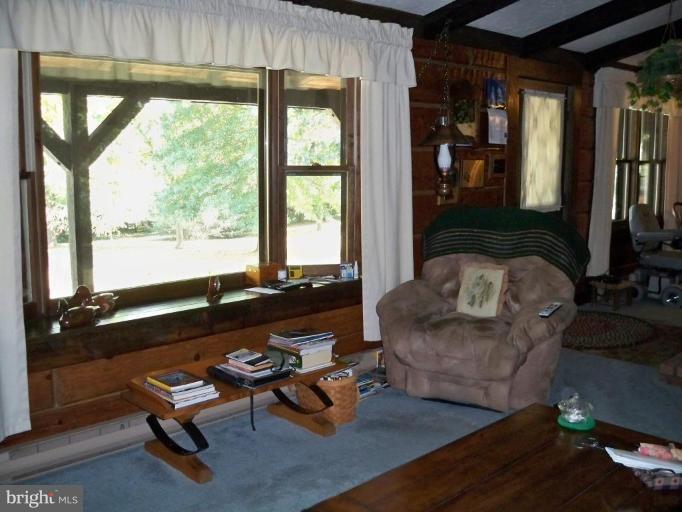 11902 Beaver Dam Road Union Bridge, MD 21791 - Photo 15 of 25 a living room with furniture and a large window