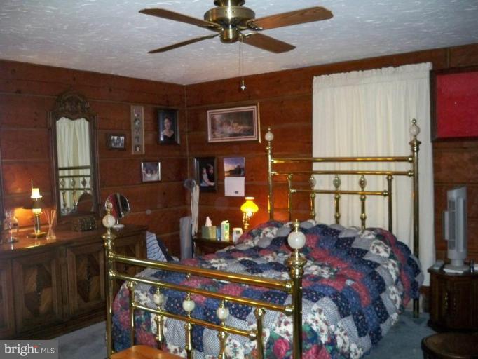 11902 Beaver Dam Road Union Bridge, MD 21791 - Photo 20 of 25 a bed room with a bed and a window