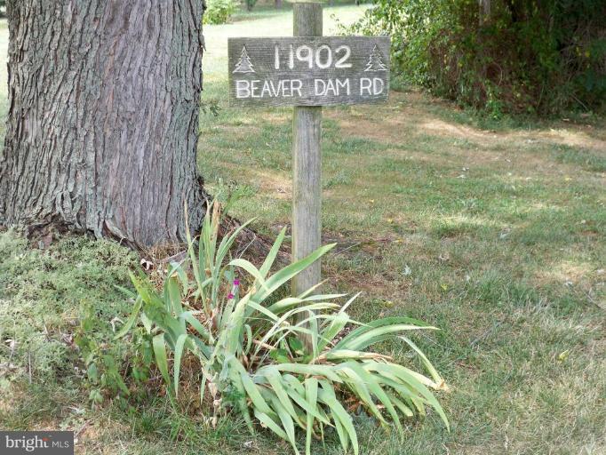 11902 Beaver Dam Road Union Bridge, MD 21791 - Photo 3 of 25 a sign broad in front of a brick building