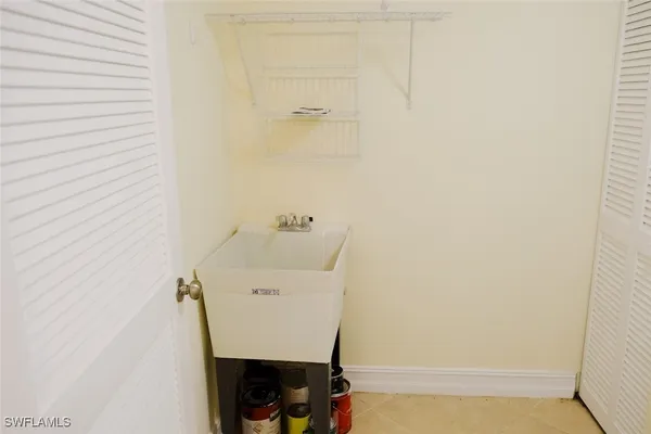 a utility room with a sink