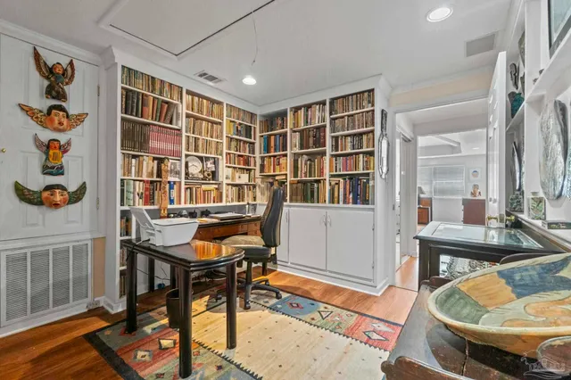 a view of a workspace with furniture and toys