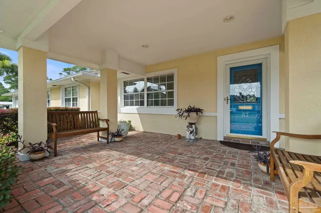 a living room with a couch and a table